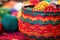 close-up of a colorful woven african basket for kwanzaa