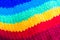 Close-up on colourful hand knitted hat
