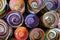 Close up of colourful, handmade brightly patterned souvenir baskets