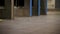 A close-up of commuters feet walking through an entry gate in a Canada Line station in Vancouver, BC.