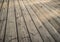 Close up of composite decking. Wood planks. Kiln dried wooden lumber texture background.