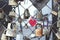 Close-up composition of padlocks hanging on the fence. Beautiful tradition of people in love. Template