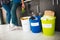 Close-up concept. Sort garbage at home. There are three buckets for different types of garbage. Young family sorts waste