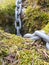 Close up Concrete Block with Moss and Heavy Thick Chain