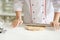 Close up of confectioner hands rolling gingerbread dough