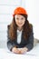 Close-up of confident architect female in casual wear working on desk.