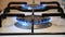 Close Up of Cooking Stove with Blue Gas Turned on