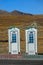 CLOSE UP: Cool colorful public restrooms sit by the side of the road in Tibet.