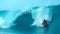 CLOSE UP: Cool surfer drags his hand through the refreshing ocean while surfing.