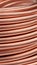 A close-up of a copper cable wire, electrical installation materiel