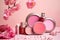 Close-up of cosmetic items on pink background