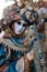 Close-up of a costume reveller poses during the Carnival in Venice, Italy