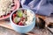 Close-up cottage sweet dessert with Strawberry jam in blue deep bowl. Healty breakfast