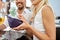 close up of couple with money paying at restaurant