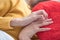 Close up couple women holding hand together on red pillow,lesbian lgbt concept.love wins.