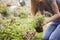 Close Up Of Couple Working Outdoors In Garden At Home Digging And Planting