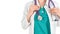 Close up cropped doctor woman with stethoscope isolated on white background. Female doctor in medical gown holds