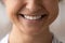 Close up cropped of Indian woman healthy toothy beaming smile