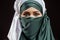 Close up cropped photo of awasome Muslim girl in green hijab