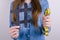 Close up cropped photo of happy satisfied lady holding showing black hashtag and yellow meter in hand  grey background