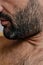 Close-up cropped portrait of a man with gray haired bristle or stubble. Mens beauty concept. Selective focus