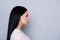 Close up cropped profile portrait of young lady in white shirt w