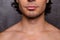Close up cropped shot of nude hot guy`s bristle, chin, has perfect skin and hair, isolated on grey background. Barber shop, beard