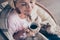 Close up cropped top above high angle view photo of cheerful peaceful middle aged woman hold mug covered with checkered