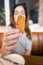 Close up croquette in woman hand