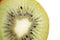 A close-up of a cross section of an organic kiwi fruit