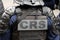 Close-up \'CRS\' (riot police) marking written on the back of a tactical vest, Paris, France