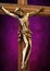 Close-up of crucifix isolated on purple and black