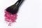 Close up of crushed blush with cosmetic brush