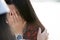 Close up of crying girl, who covers her face with both hands. Woman comforting crying girl, comfort a friend. Friendship concept