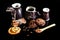 Close-up cup of espresso coffee, milk and cocoa spoon, round crunchy chocolate cookies with coffee beans, sticks of cinnamon on a