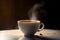 close-up of cup of perfectly brewed coffee, with steam rising from the hot beverage