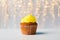 Close up of cupcake or muffin with yellow frosting