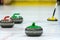 Close up of a Curling game situation.