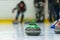 Close up of a Curling game situation.