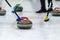 Close up of a Curling game situation.