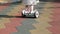 Close-up cute preschooler girl riding white hoberboard at children playground in city park outdoors