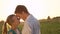 CLOSE UP: Cute young couple is about to kiss on a beautiful summer evening.
