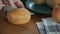 A close-up of Cutting bread on the wooden board