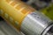 Close-up of the cylinder with glued flexographic printing form from a photopolymer. Preparation of equipment for