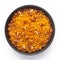 Close-Up Dal Bijli or Dal moth in a black ceramic bowl, made with roasted Masoor Dal black lentils. Indian spicy snacks Namkeen