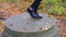 Close-up of dancing feet on a pedestal.