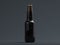 Close up of dark beer glass bottle on black backround, 3d rendering.