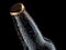 Close up of dark beer glass bottle neck on black backround, 3d rendering.