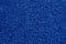 Close up of dark blue color carpet texture background with seamless pattern