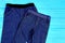 Close up of dark blue stretch jeans for child.